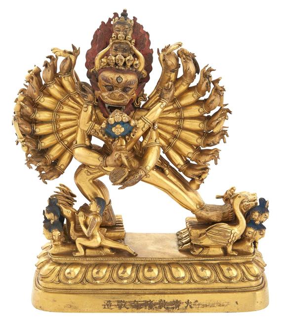 Chinese Gilt-Bronze Figure of Vajrabhairava and Vajra Vetali, Qianlong Six-Character Mark on Base, Height 7 1/2 inches.  Est.  $20,000-30,000 