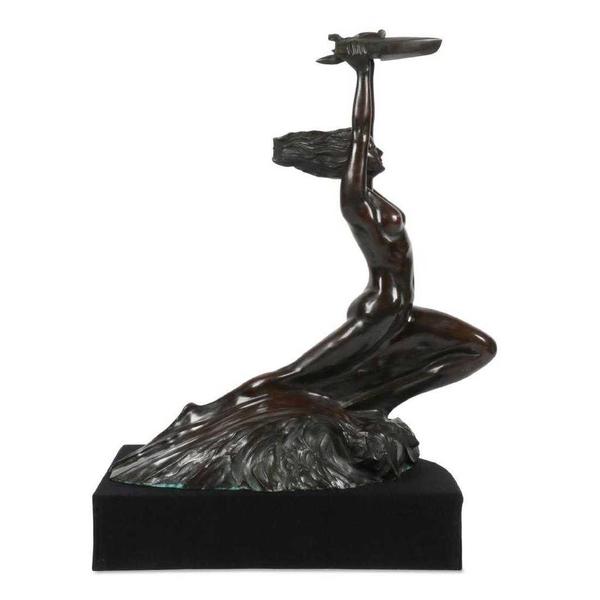 Monumental Art Deco bronze statue by McClelland Barclay (Am., 1891-1943), titled Spirit of Speed, from which Barclay’s well-known miniatures were inspired (est.  CA$8,000-$12,000).  