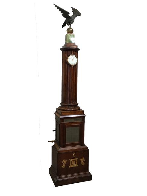 Magnificent 19th century French barrel organ clock, circa 1884, 8 feet 6 inches tall, topped by a bronze eagle perched on an alabaster plinth, a carved fluted column containing the clock.