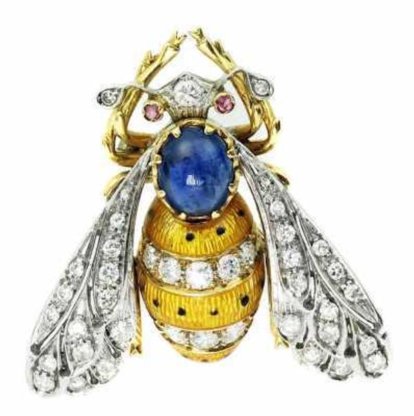 This 18kt gold, diamond and enamel "Bee" brooch, centered by an oval cabochon sapphire, will be sold Sunday, December 15th.