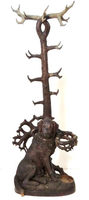 This antique Black Forest hall rack, rare because of its finely carved life-size 30-inch dog, sold for $19,600 at S & S Auctions, Inc., on Nov.  16-17 in Repaupo, N.J.