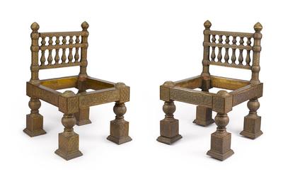 A pair of chased brass-overlaid teak chairs designed by Lockwood de Forest (1850-1932).  India, 1881-1882.  Estimate $ 50,000 - 80,000