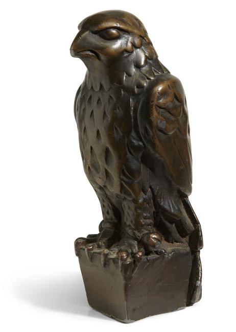 The iconic lead statuette of the Maltese Falcon from the 1941 film of the same name.  Approx dimensions: 11 7/8 H.  x 4 1/2 in D.  x 5 in wide.