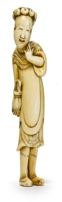 A tall ivory netsuke of a Chinese court noble.  Kyoto or Osaka, Edo period (18th century).  5 3/8in (13.7cm) high.  Sold for $86,500.