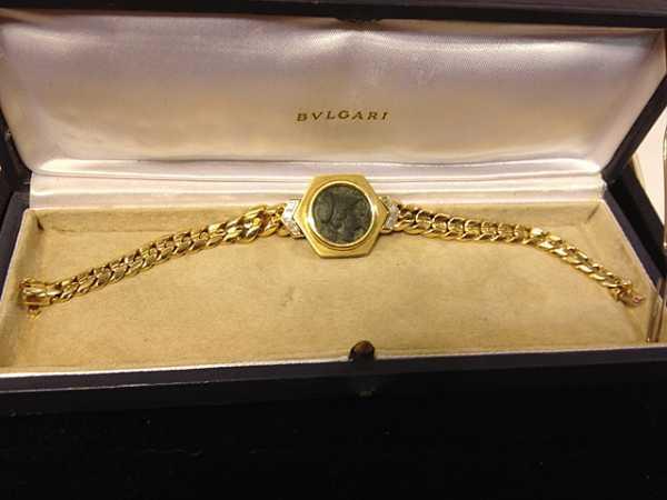 This stunning Bvlgari 18kt gold and diamond bracelet with an ancient coin at the center will be auctioned Nov.  17th.