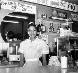 Ernest T.  Withers, American (1922-2007) Helen Ann Smith at Harlem House, Beale St., Memphis, Tennessee 1959, printed ca.  2000.  Gifts of Ernest C.  Withers and Panopticon Gallery 2000.1.2.  This work was lent by the Chrysler Museum of Art.