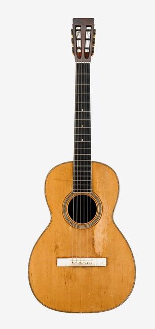 C.  F.  Martin Guitar, Style 0-40, c.1880, used in performances and recordings by Joan Baez 1966-68.  Sold for $12,500.