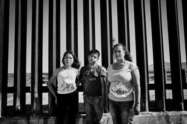 Candy at the Wall | Candy, pictured with her son and daughter, was sexually assaulted and her family constantly threatened by gangs in Guatemala.  She was granted asylum on September 6th ahead of the September 11th Supreme Court ruling.  She is reunited with her husband.  Her daughter who is now 18 and considered an adult, must wait for her own court date.  Ada Trillo keeps in constant touch with Candy.