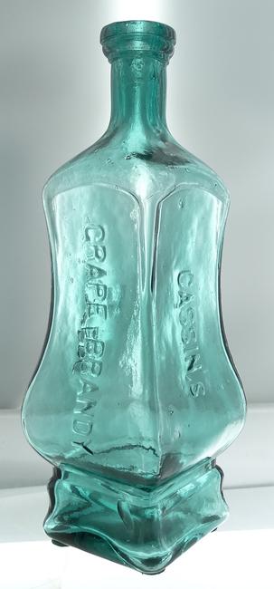 This 150-year-old blue Cassin’s Grape Brandy Bitters bottle so rare that for years many doubted its very existence, circa 1867-1868, bluish teal in color, sold for a staggering $155,000.