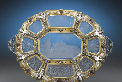 This resplendent Viennese charger is inset with nine intricately engraved panels of rock crystal