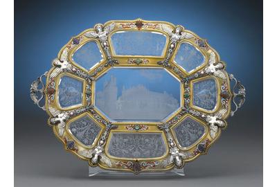 This resplendent Viennese charger is inset with nine intricately engraved panels of rock crystal