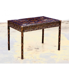 Early 19th century Chinese Export black and gilt lacquer games table, having a top with four counter recesses, the reticulated frieze fitted with a single drawer (est.  $1,200-$1,800).