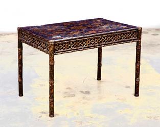 Early 19th century Chinese Export black and gilt lacquer games table, having a top with four counter recesses, the reticulated frieze fitted with a single drawer (est.  $1,200-$1,800).