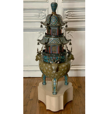 Chinese cloisonné brazier in pagoda form resting on a tripodal imperial Nara deer base, on a pedestal, 52 inches tall, including the 8 ½ inch tall 20th century pedestal.