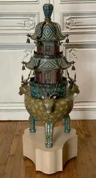 Chinese cloisonné brazier in pagoda form resting on a tripodal imperial Nara deer base, on a pedestal, 52 inches tall, including the 8 ½ inch tall 20th century pedestal.