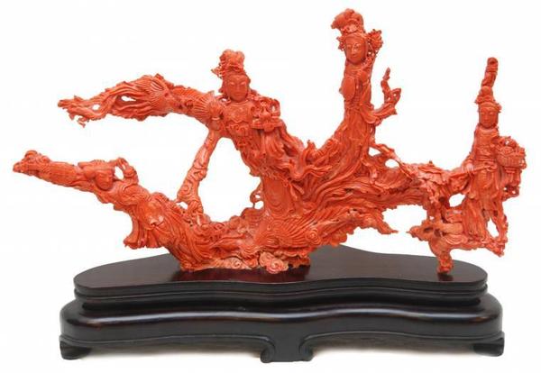 This Chinese red coral sculpture depicting Guan Yin figures sold for $66,550.