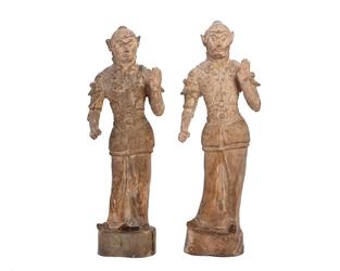 Two Chinese pottery models of warriors from the Tang dynasty, each one 34 inches tall (est.  $4,000-$6,000).