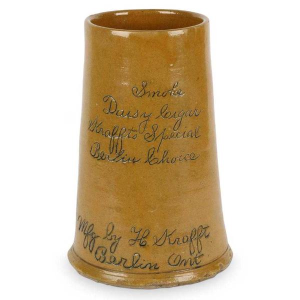 Egmondville clay master stein, one of the few advertising objects to surface in early Canadian pottery, 11 ¾ inches tall and reading, “Mfg by H.  Krafft Berlin Ont” (est.  $14,000-$16,000).  