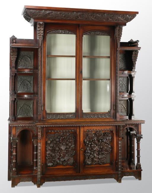 This gorgeous Cincinnati art carved cabinet sold for $7,400 -- to a descendant of the maker, William Fry.