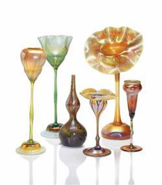 TIFFANY STUDIOS, A Selection of Decorated and Floriform Favrile Glass Vases, circa 1900-1910.  Estimates from $5,000 to $20,000.