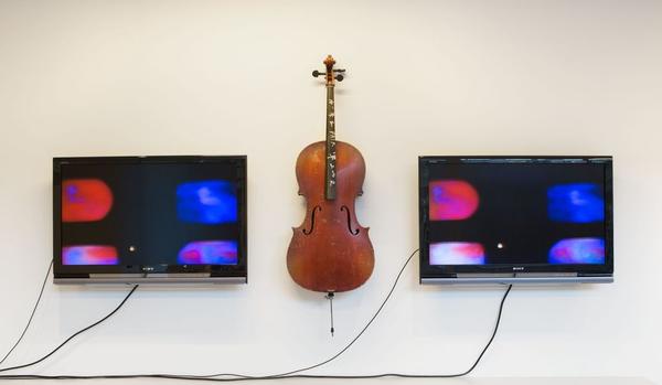 Nam June Paik, Cello Memory, 2002.  Sculpture.  1 Channel Video Installation with 2 40" LCD Monitors.