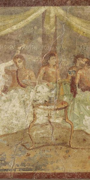 Fresco wall panel showing a dinner party with painted messages: FACITE VOBIS SUAVITER EGO CANTO and EST ITA VALEAS (make yourselves comfortable; I am singing; go for it!) AD 40–79, Pompeii, House of the Triclinium, 68 x 72 cm.  Museo Archeologico Nazionale di Napoli