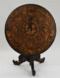 19th century Dutch marquetry tilt-top breakfast table, highly detailed, round-top table boasting hunting scenes and an intricate openwork apron, 29 ½ inches by 38 inches (est.  $1,000-$1,500).