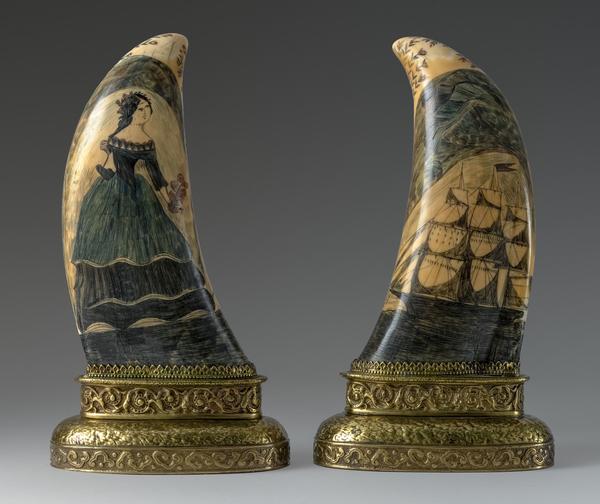 Pair of masterpiece scrimshaw whale's teeth by whaleman Eli Bangs, Jr.