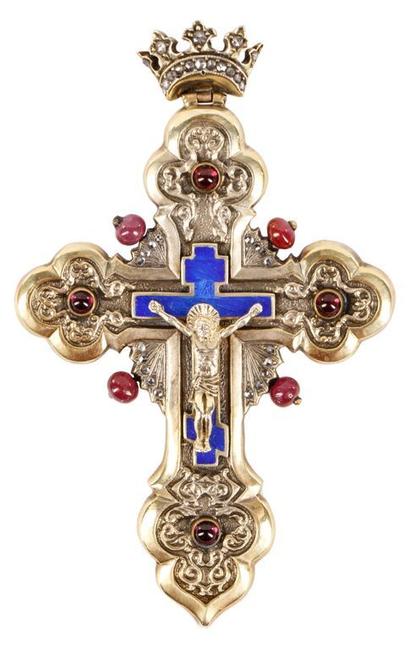 This early 20th century Faberge gilt silver, diamond, ruby and guilloche enamel crucifix necklace pendant is expected to bring $8,000-$12,000.