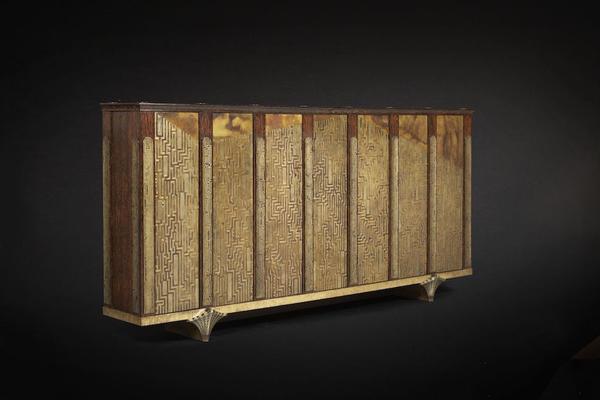 Eugène Printz & Jean Dunand, Collector's cabinet, 1937.  Palm wood, metal panels, silver inlay.  Est: €800,000–1,000,000 ($896,000–1,100,000).