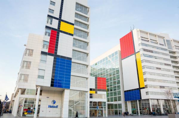 The Hague is celebrating ‘100 years of Mondriaan and De Stijl’ with a Mondrian-draped city hall buildng, and more.