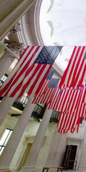 Exhibition view of A Living Thing: Flag Exchange, curated by Hesse McGraw, at Federal Hall, New York, 2017.  Photo: Guillaume Ziccarelli