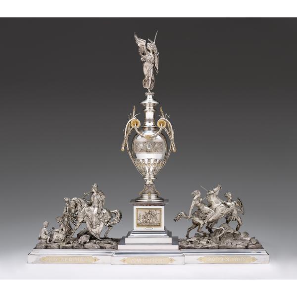 The Progress Vase A magnificent sterling silver and silver-plated centerpiece.  Designed by W.C Beattle for Reed & Barton and awarded a medal of excellence at the 1876 Philadelphia Centennial Exhibition $150,000-250,000