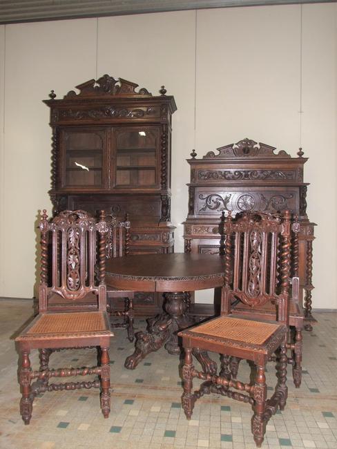 9-piece Louis XIII-style winged griffin dining room suite, heavily carved oak, featuring a barley twist buffet de corps, dessert serving buffet, gueridon table and six chairs (est.  $2,500-$3,000).