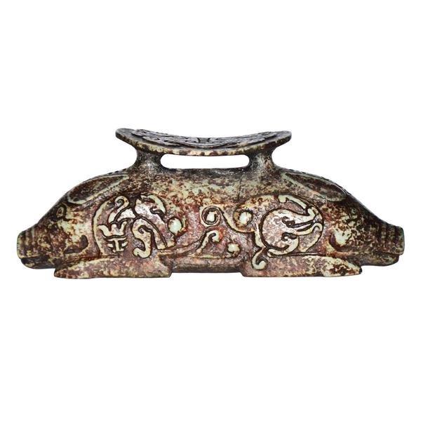 Warring States carved jade pillow.  Headrest above two hogs.  Gianguan Auctions Lot 254, September 9.