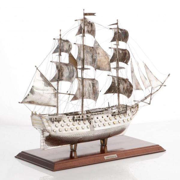 Italian parcel gilt sterling silver model of the H.M.S.  Victory from the second half 20th century, 18 inches tall by 23 inches long, silver weight approx.  37 oz.  troy (est.  $1,500-$2,000).