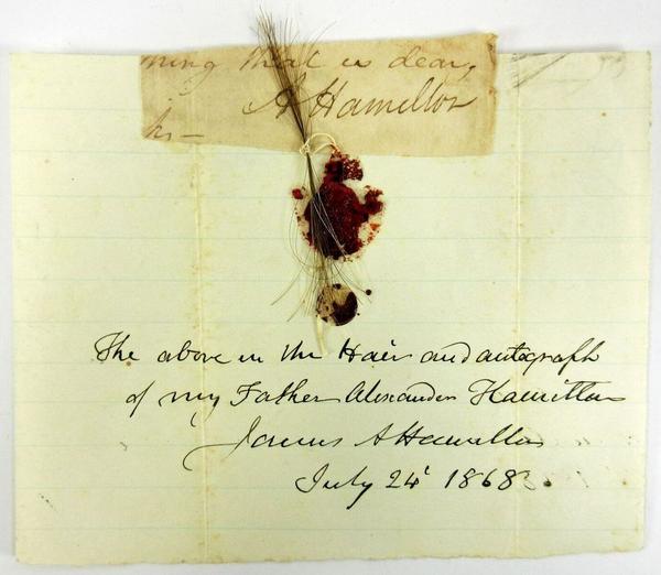 Lock of Hamilton's hair, and his signature, with a seal and note penned by a descendant in 1868.