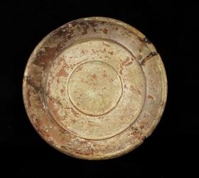 This Chinese Han Dynasty (circa 206 BCE-220 CE) plate, from the collection of Dr.  Morris V.  Shelanski, 8 ¾ inches in diameter, is estimated to change hands for $1,000-$1,500.  