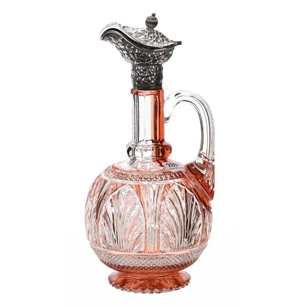 Brilliant Period Cut Glass handled apricot cut to clear decanter, 11 inches tall, with a beautiful embossed floral sterling silver lidded spout marked Theodore B.  Starr and a scalloped pattern cut foot.  