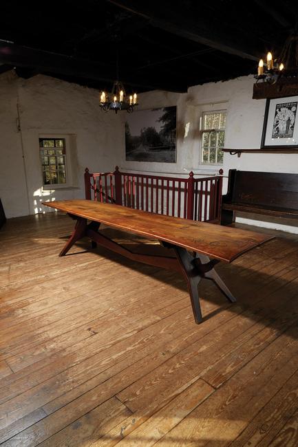 Lot 43, Wharton Esherick (American, 1887-1970) The Important "Thunder Table" for Hedgerow Theatre, Paoli, Pennsylvania, 1929.  Oak, Carved signature, date and inscription: "WE+HEDGEROW MCMXXIX" 