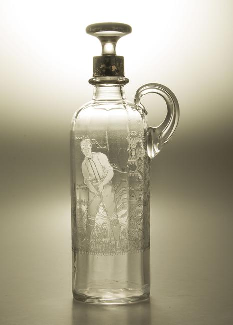 Locke art glass liquor decanter with golf theme valued at $250/500 in Witherell's Holiday Auction Dec 6.