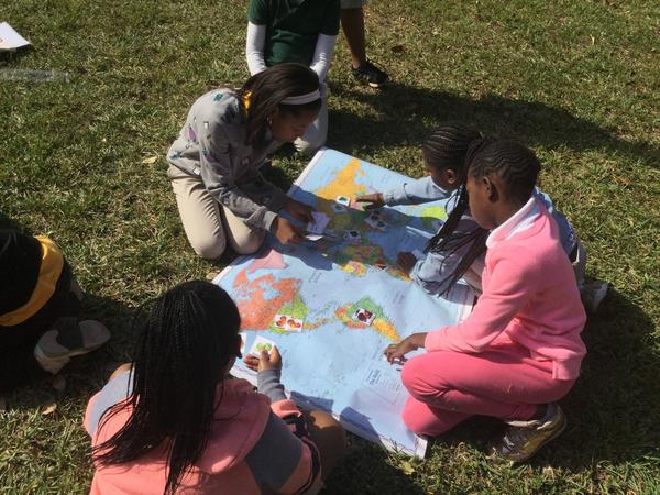 Students map the journey of common fruits and vegetables from their place of origin around the world to Miami, Florida