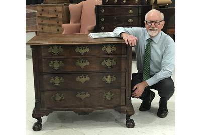 Partner Steve Fletcher with a Fine and Rare Chippendale Carved Mahogany Reverse Serpentine Bureau, coastal Massachusetts, c.  1760-80.  Sold for $291,000