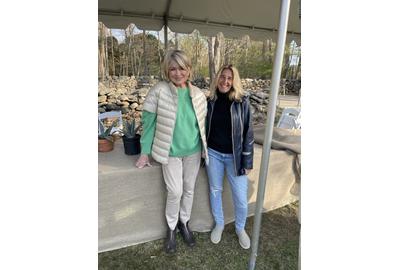 Martha Stewart and The Benefit Shop Foundation, Inc.  founder Pam Stone pose for a photo on day one of her recent tag sale.