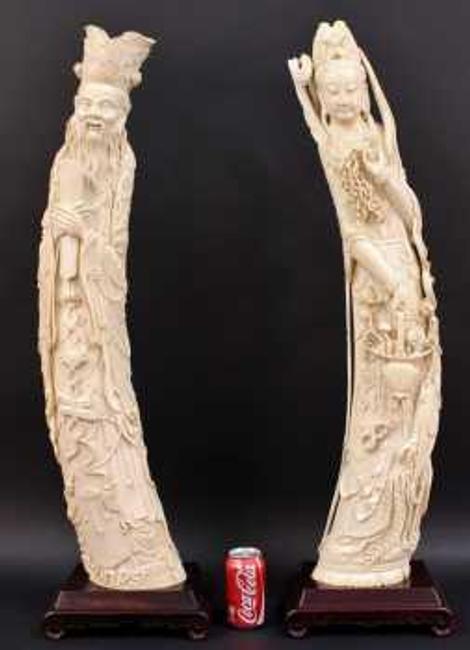 This pair of Chinese carved antique ivory tusk figures sold for $45,000 at auction, Jan.  4-5.