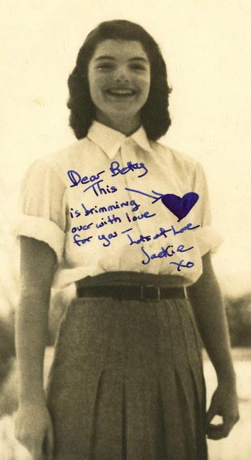 Jackie Kennedy, as a 16-year-old high school student at Miss Porter’s School, has doodled a heart and dedicated a vintage black and white photo to a chum named Betty (est.  $1,500-$1,700).