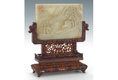 Lot 289.  Carved White Jade Screen in Boxwood Stand, ca.  1750