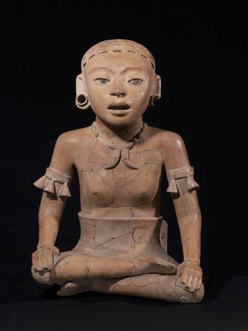 An important 21 inch tall Veracruz Remojadas figure of a young woman, dating to 600-900 CE.