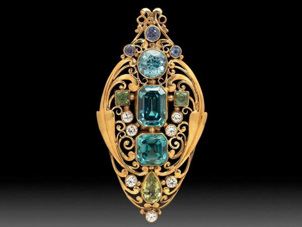 Frank Gardner Hale, jeweled scroll brooch, about 1920.  Gold, zircon, diamond, sapphire, peridot.  Gift of Joseph B.  and Edith Alpers.