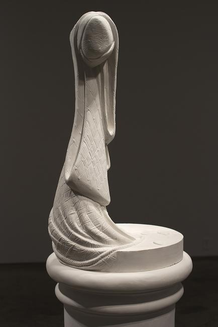 Lily Cox-Richard, The Stand: Fisher Boy, 2013, carved plaster.  H:68 W:20 D:20 